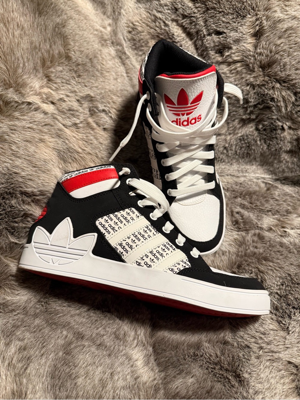 adidas Black & White High-Top Sneakers with Red Logo Accent